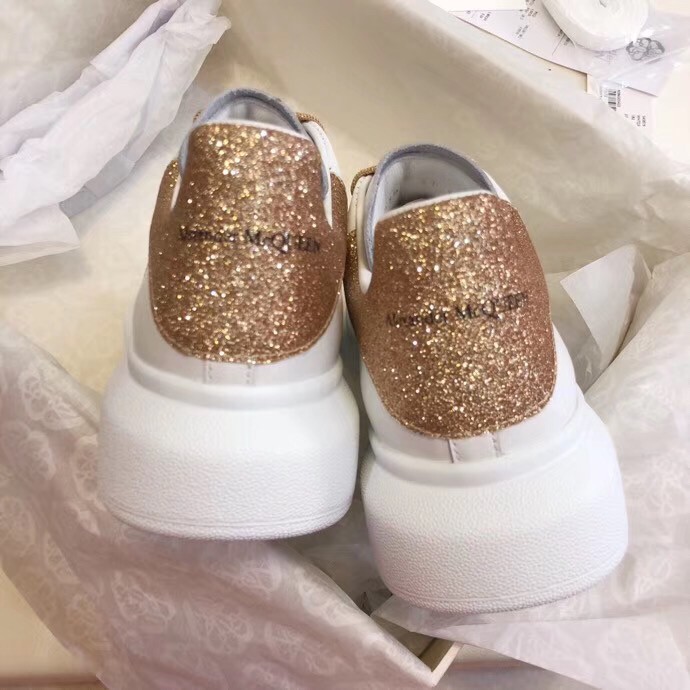 Replica Alexander McQueen Women’s Oversized Sneakers With Gold Glitter Heel 110