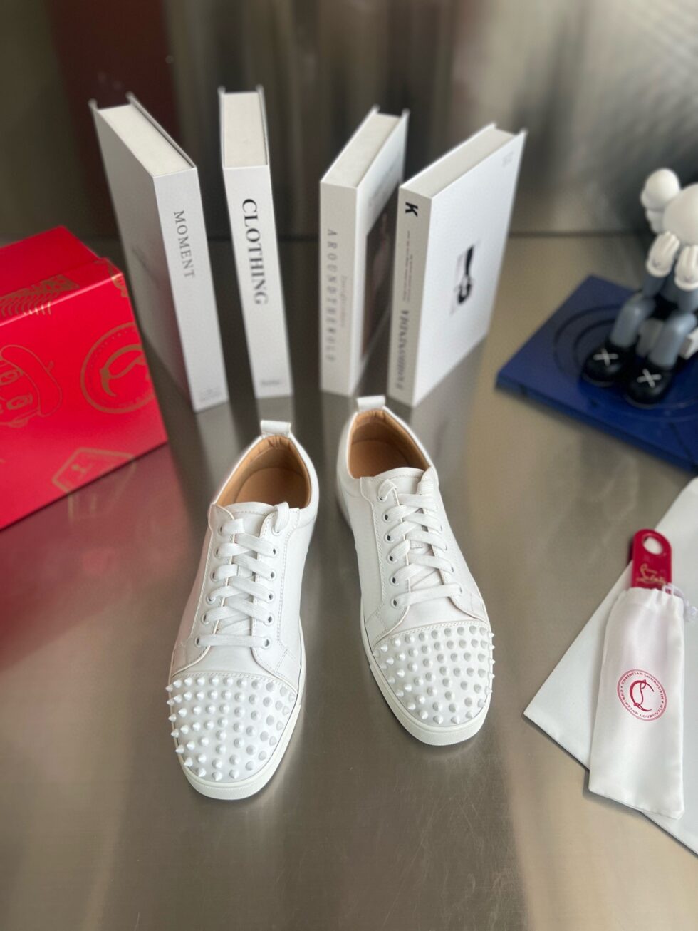 Replica Christian Louboutin Women’s Louis Junior Spikes Sneakers In White Leather 105