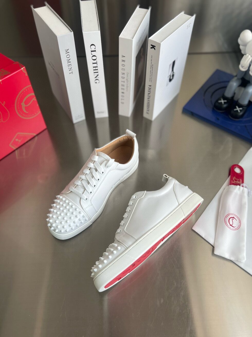 Replica Christian Louboutin Women’s Louis Junior Spikes Sneakers In White Leather 109