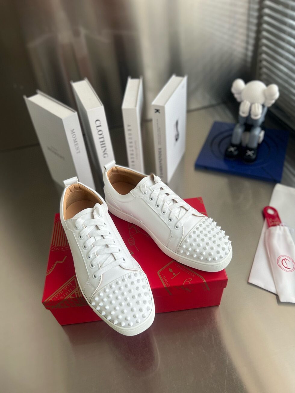 Replica Christian Louboutin Women’s Louis Junior Spikes Sneakers In White Leather 111