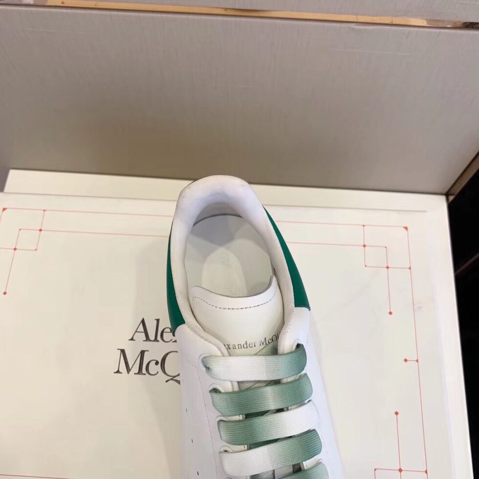 Replica Alexander McQueen Women’s Oversized Sneakers With Green Heel 105