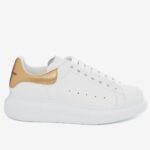 Replica Alexander McQueen Women’s Oversized Sneakers With Gold Heel