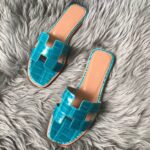 Replica Hermes Oran Slide Sandals In Blue Paon Shiny Niloticus Crocodile Skin