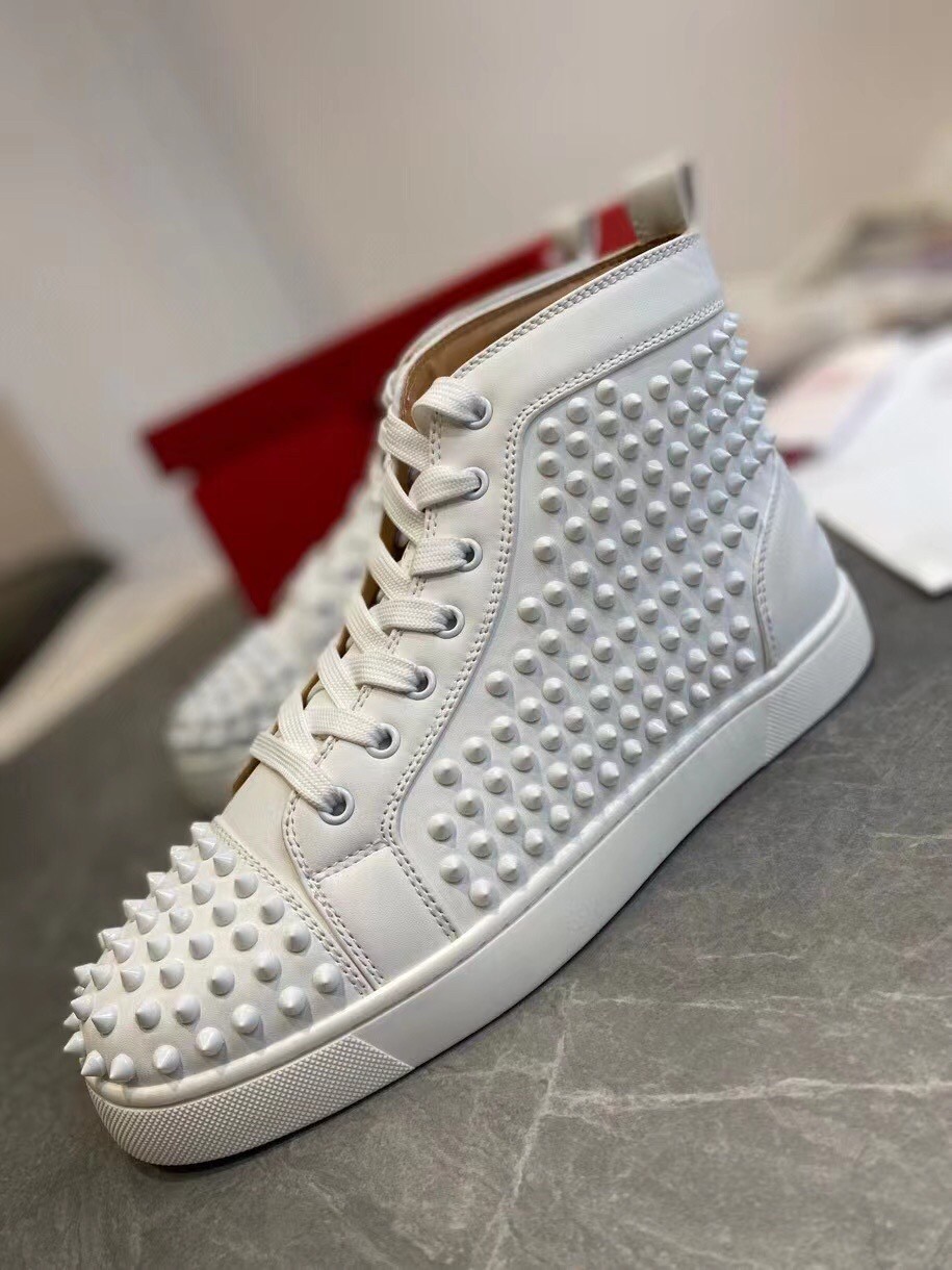 Replica Christian Louboutin Men’s Louis Spikes Flat Sneakers In White Leather 108